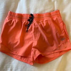Coral Reebok gym shorts
